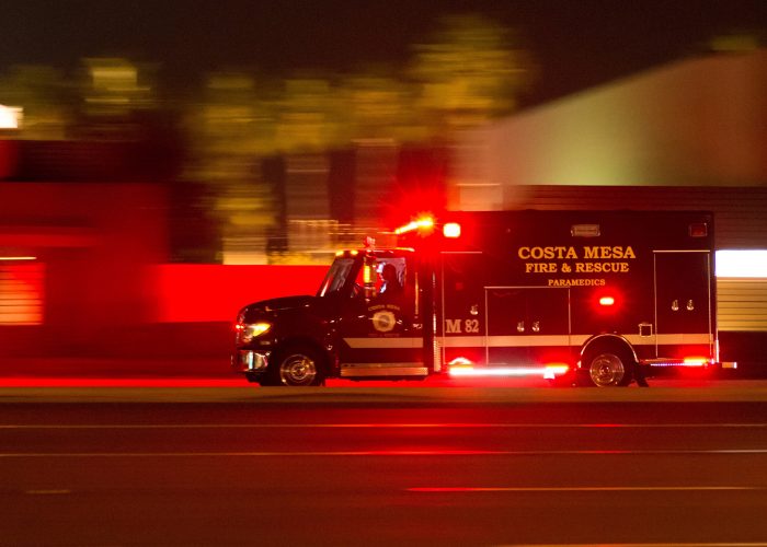 ambulance at night with lights flashing.
