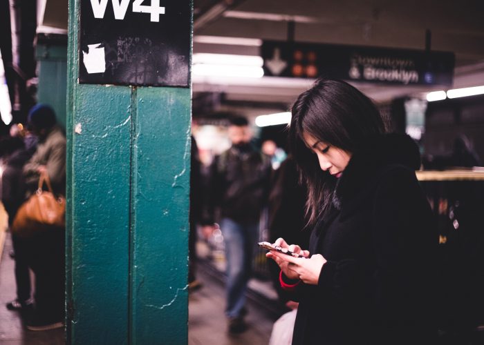 woman on subway platform in new york
