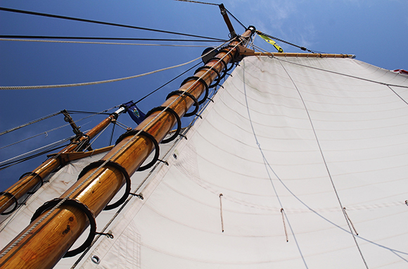 Hoisting the Sails on Schooner Olad