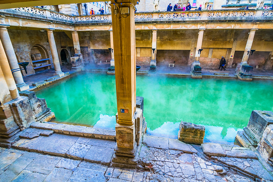 Bath, England - December 10 2017: Steaming Roman Baths in winter  