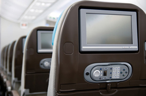 Movie Watching on an Airplane Is a Judgment-Free Zone, Right?