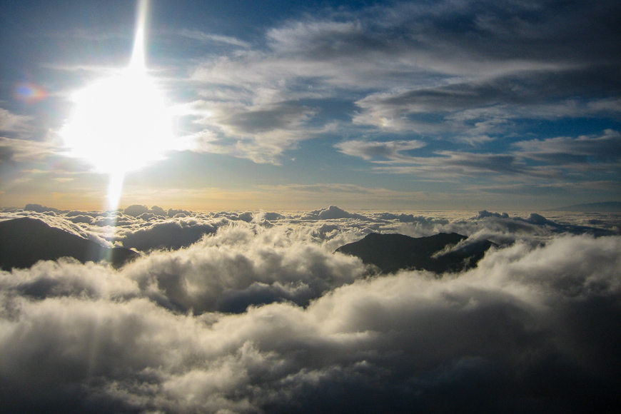 Sea of clouds with the bright sun on haleakala national park