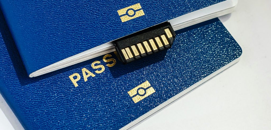 Two passports with an international SIM card