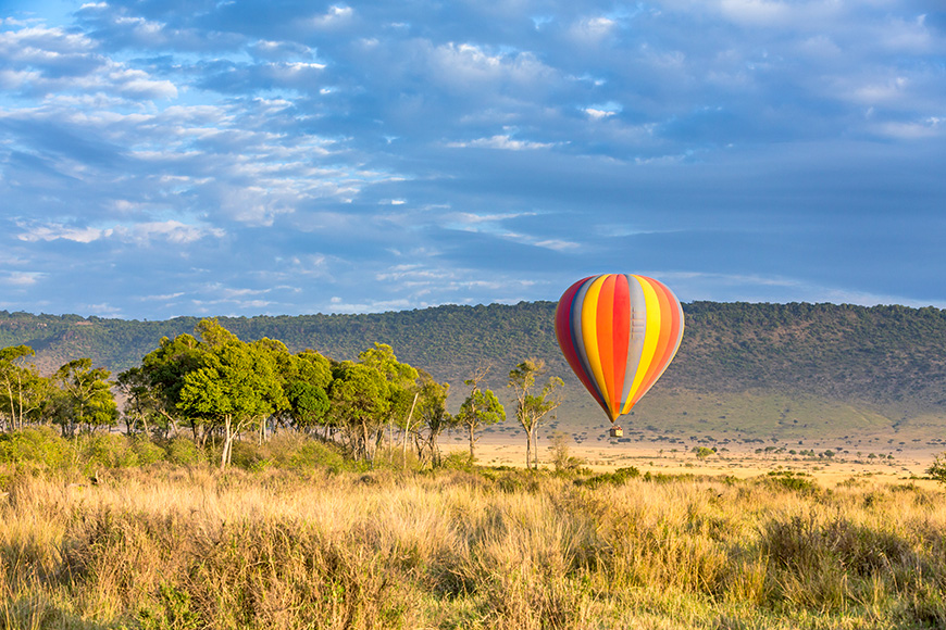 Low flying hot-air balloon in the Masai Mara, Kenya
