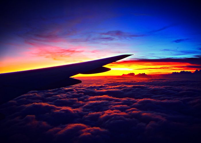 airplane wing at sunrise.