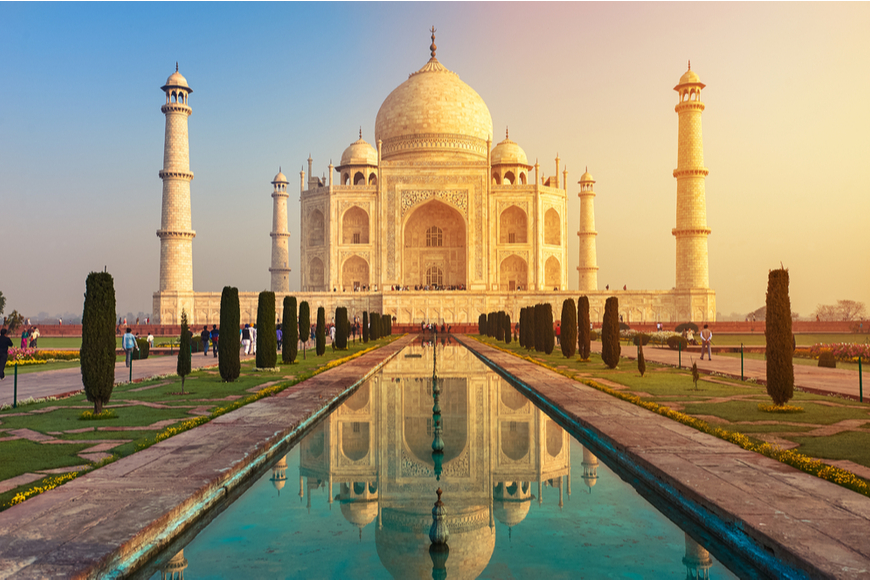 Taj Mahal reflection at sunrise India.