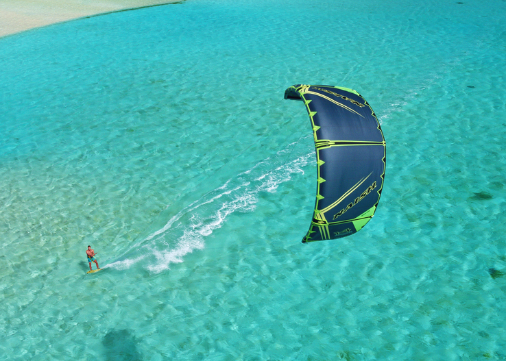 Kitesurfer in blue water