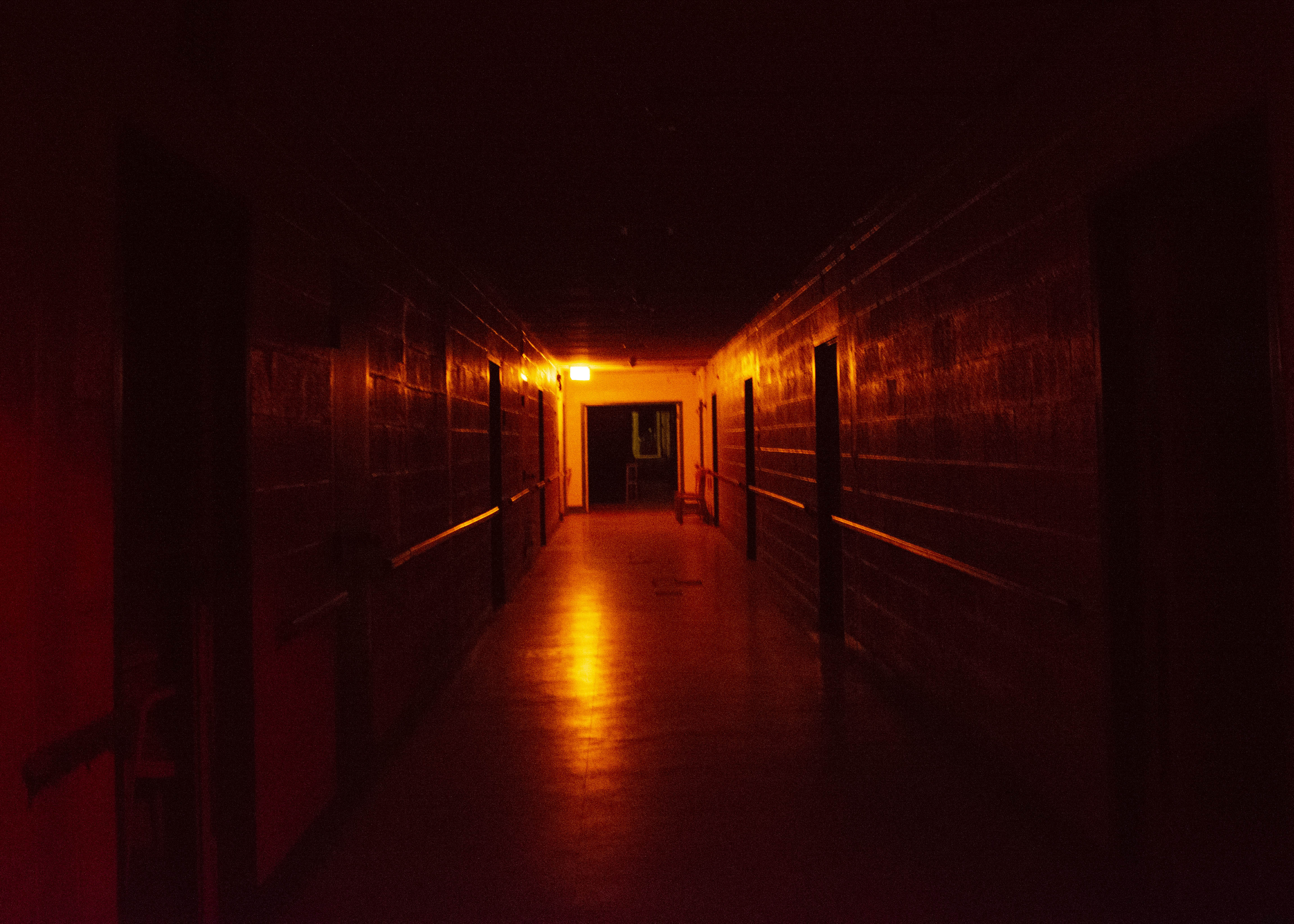 spooky hallway inside rolling hills asylum