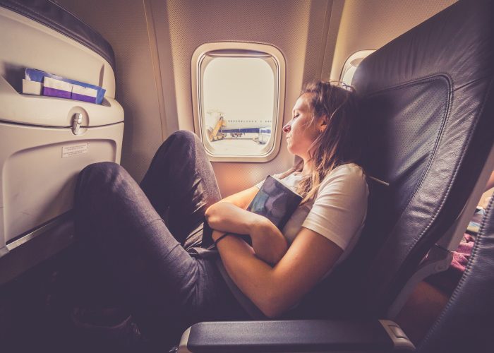 The One Thing You Need to Do on a Red-Eye Flight hero