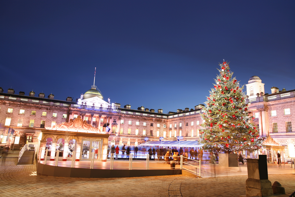 ice skating rink with christmas tree outdoors in london