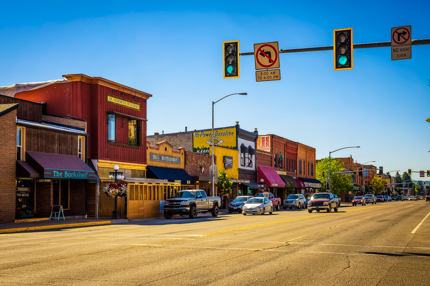 Scenic street view with shops and restaurants in Kalispell, Montana.