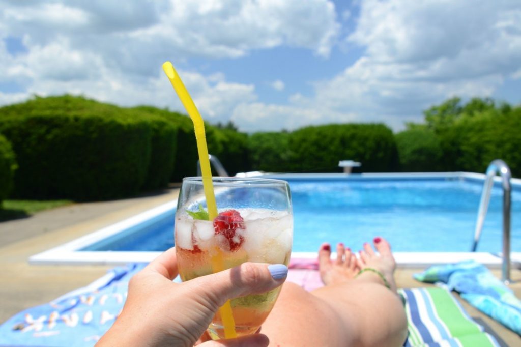 summer-drink-swimming-pool-sunbathing-female-cocktail-pool-beverage-drinking-summertime