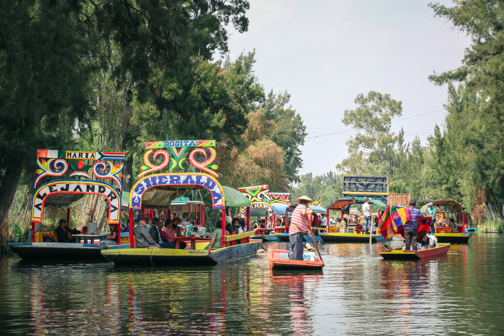 colorful river boats along a canal.