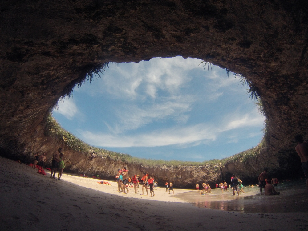 hidden cave beach in mexico.