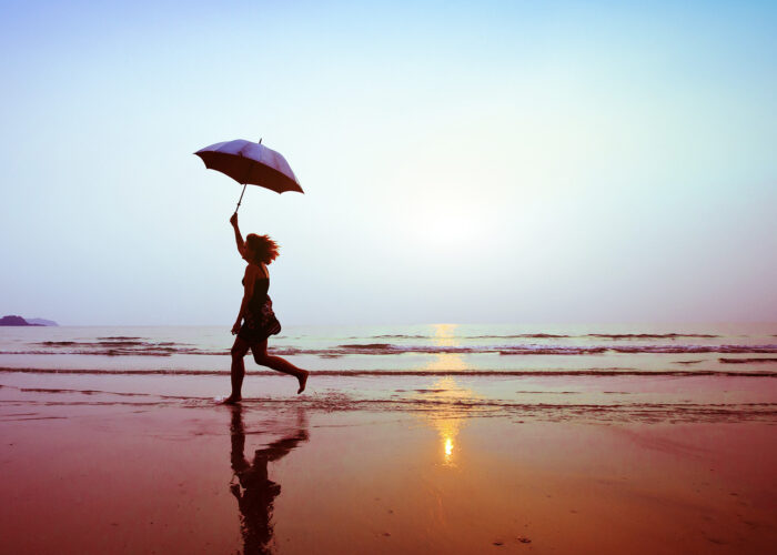 woman umbrella beach