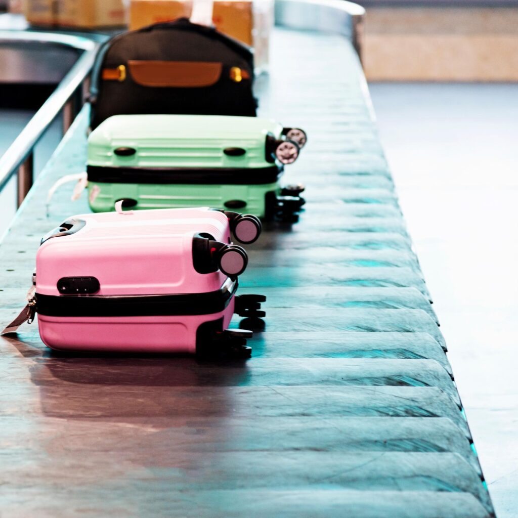 suitcases on conveyor belt