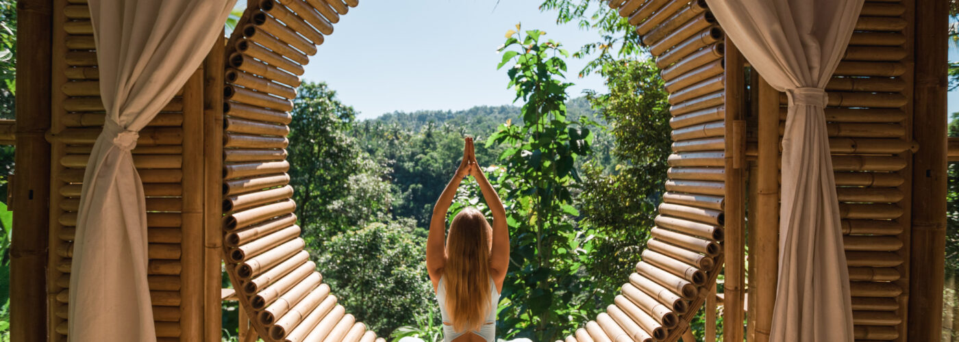 woman-yoga-pose-open-air-resort