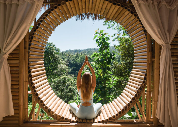woman-yoga-pose-open-air-resort