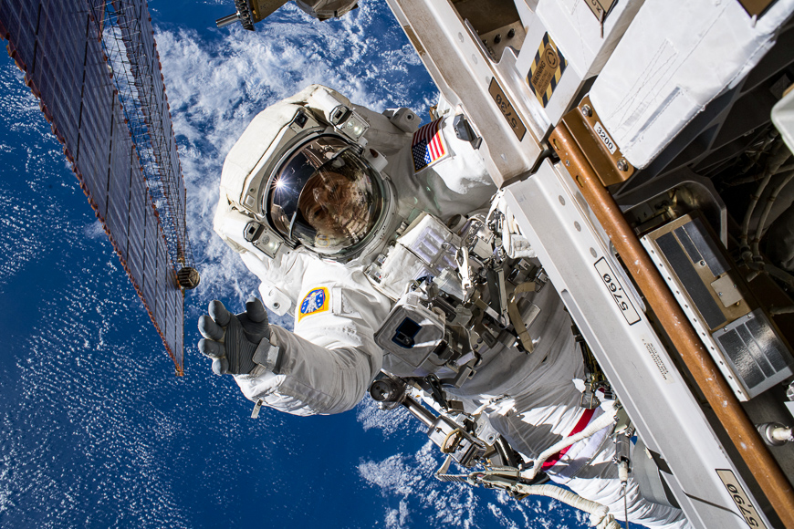 Astronaut does a space walk in as he upgrades cameras on the orbital platform.