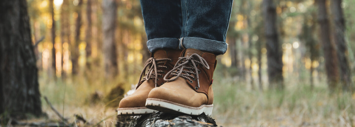 man wearing jeans and stylish hiking boot