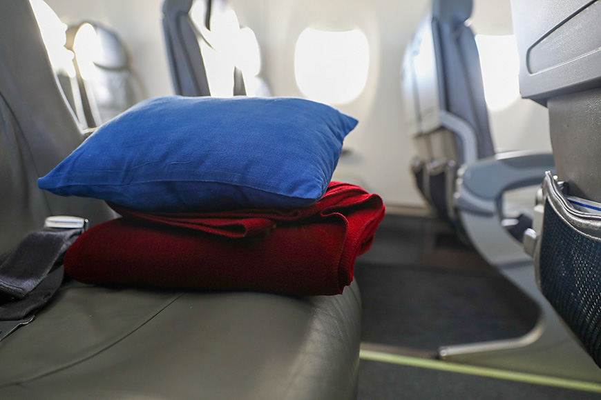 blanket pillow flight plane seat