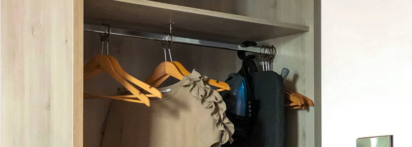 hanging shirt or dress hangers closet hotel room