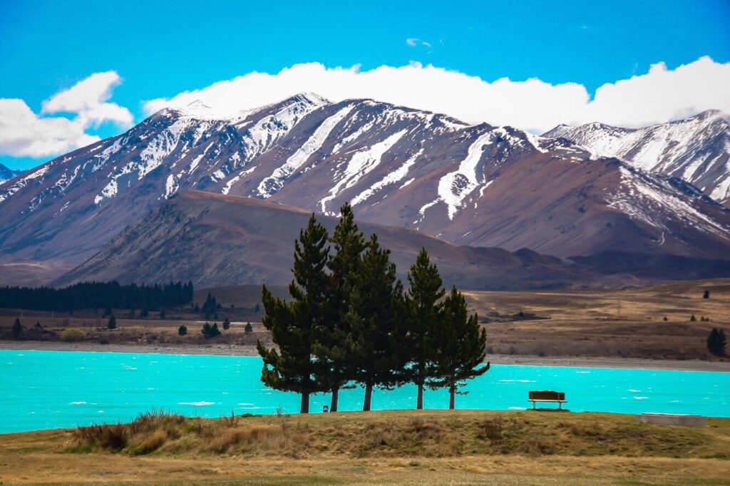 new zealand lake with mountain in background