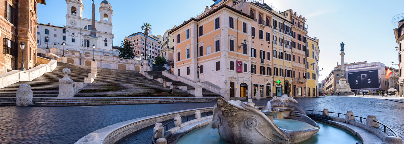 Two foreign tourists take pictures on the Spanish Steps, Rome, Italy. Popular tourist sites have been deserted following the nnationwide coronavirus pandemic lockdown.