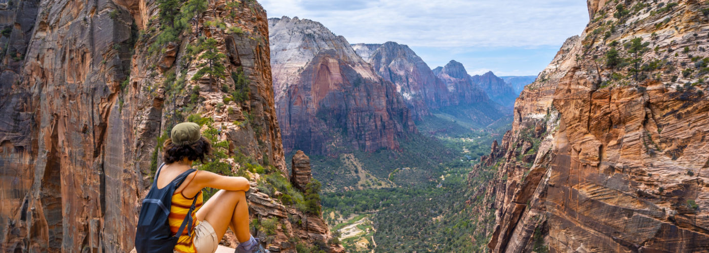 Young hiker sitting in Zion National Park