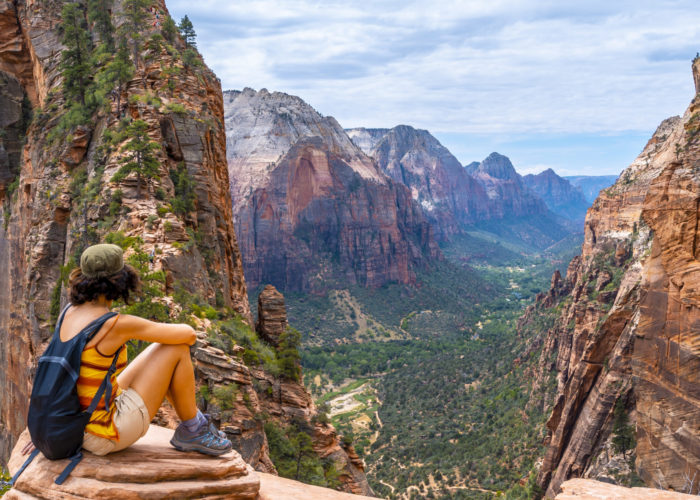 Young hiker sitting in Zion National Park