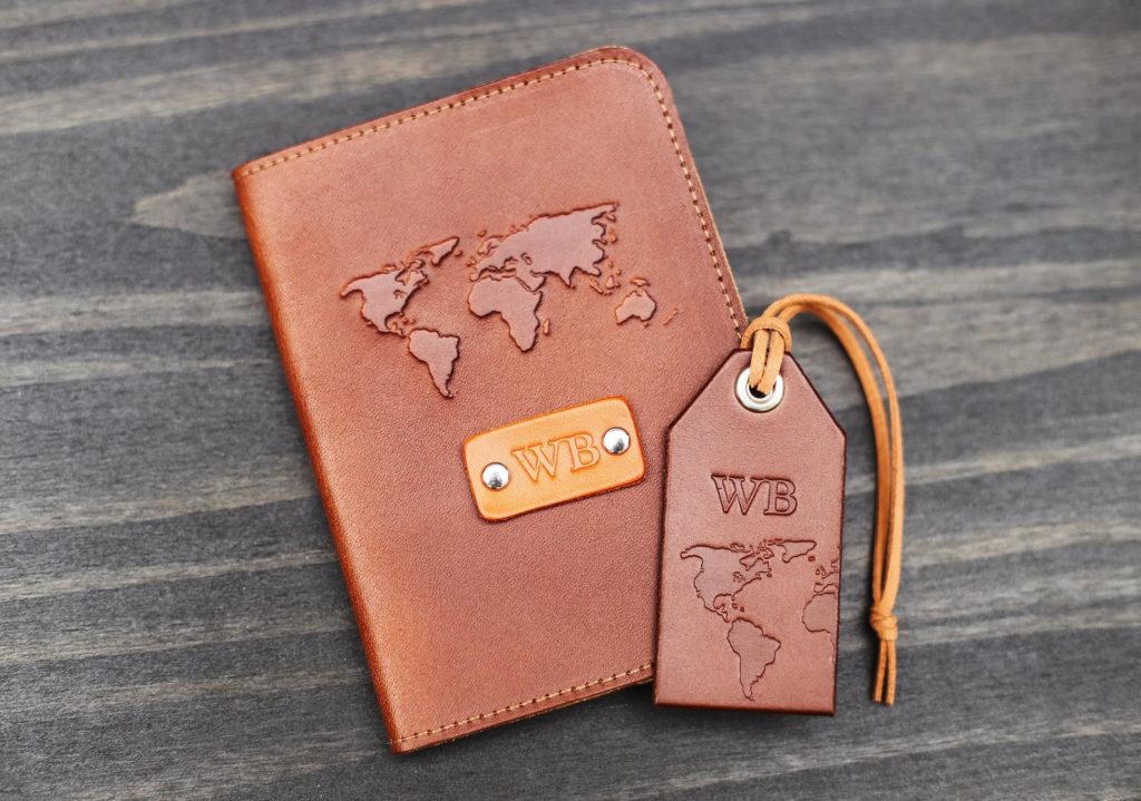 Leather passport cover and luggage tag with world map design