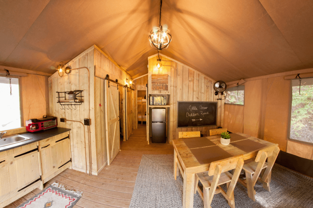 The inside of a glamping tent at Little Arrow Outdoor Resort