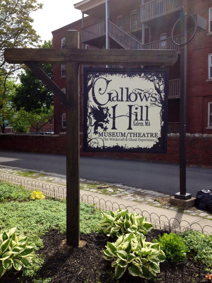 The front sign for Gallows Hill Museum and Theatre in Salem, Massachusetts