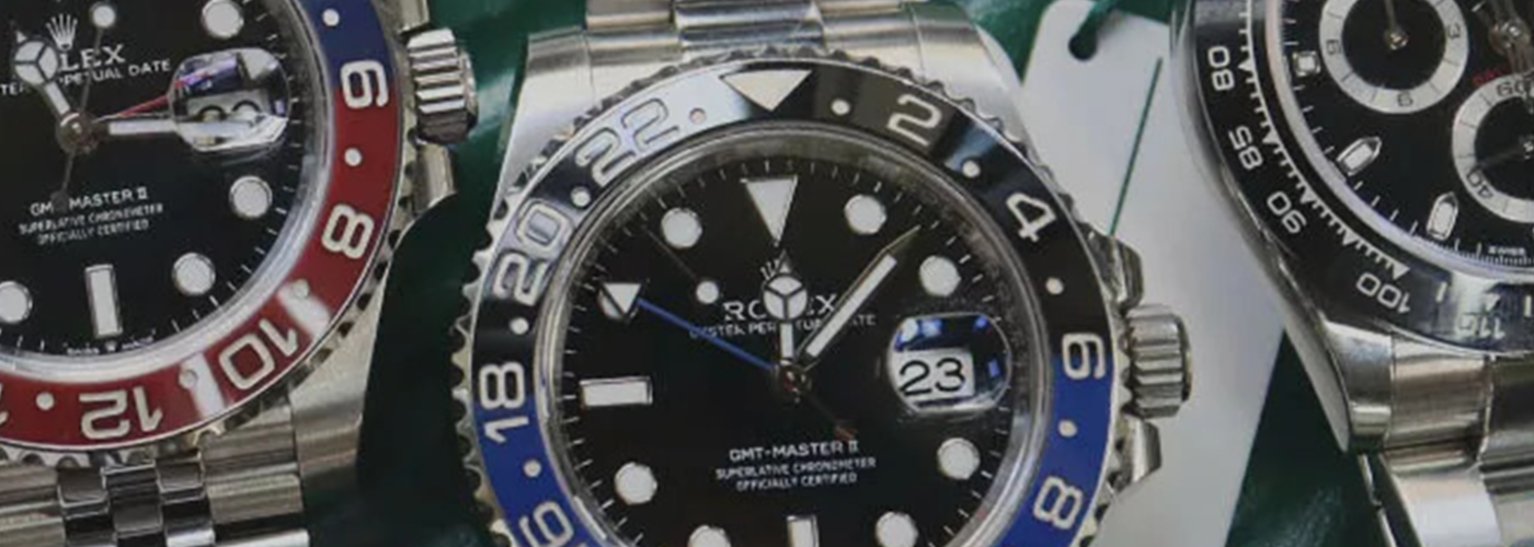 Three Rolex watches side by side