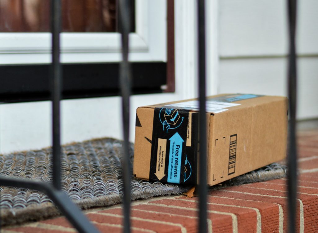 Amazon package on front stoop of house