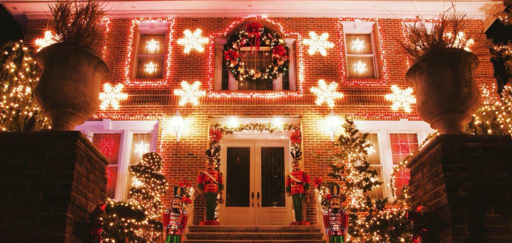 Brick building decked out in Christmas lights for the Dyker Heights Christmas Lights event