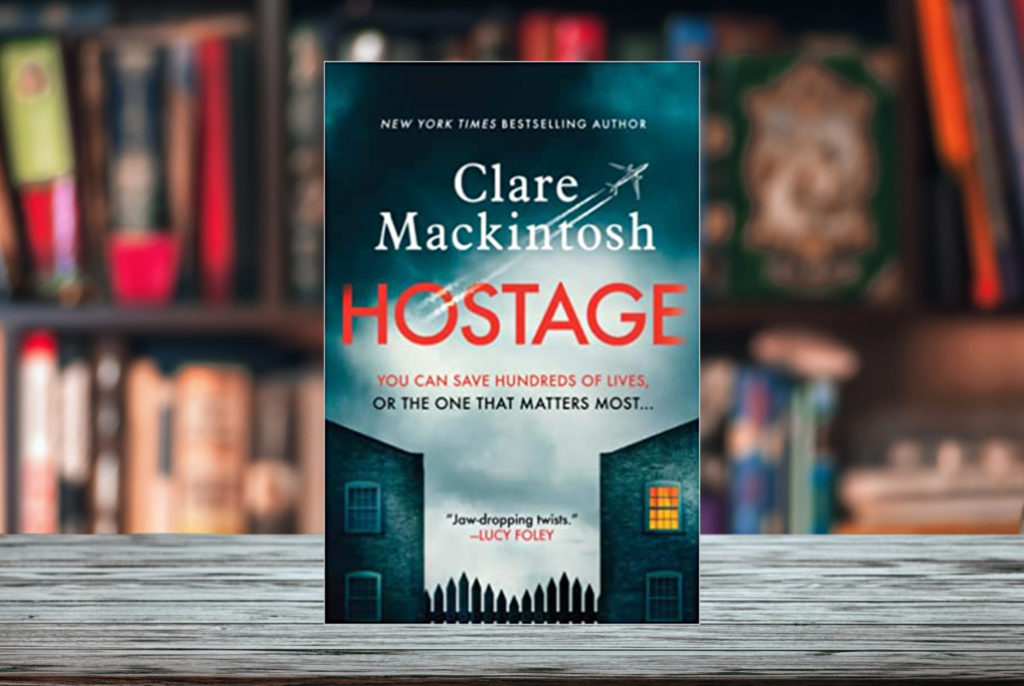 Cover of Clare Mackintosh's book Hostage superimposed on a bookshelf with shelves of books in the background