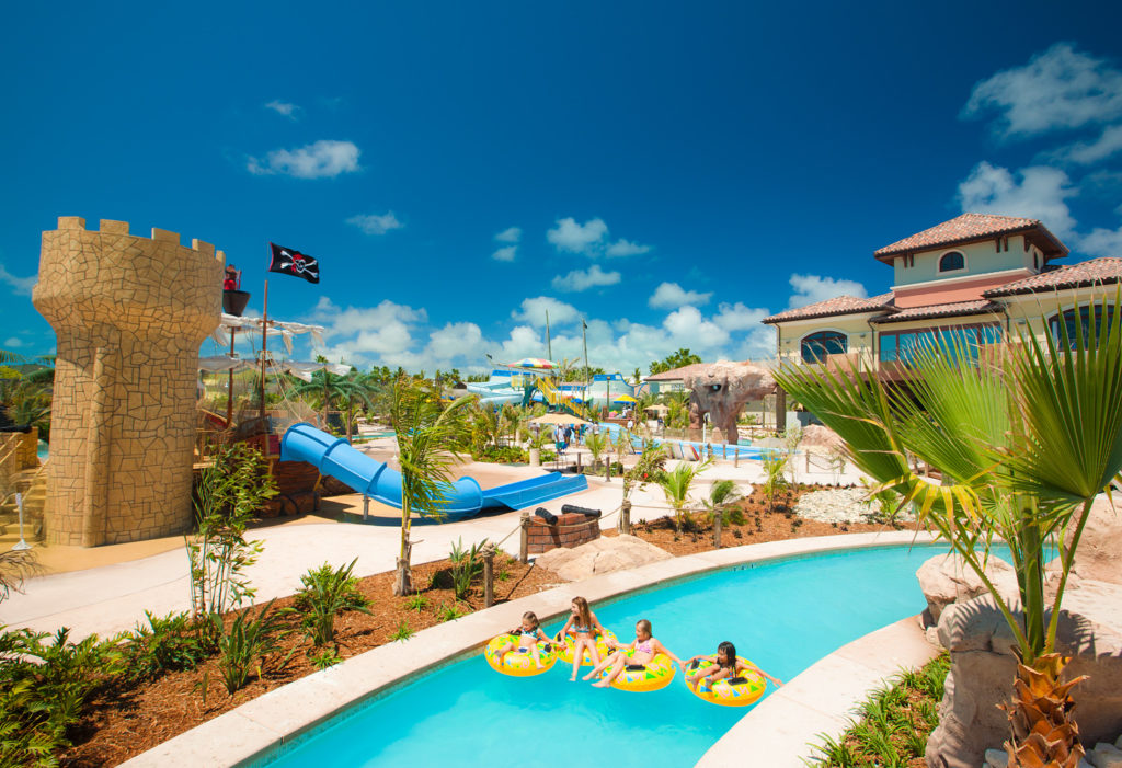 Kids playing on innertubes in the lazy river at Beaches Turks & Caicos; Providenciales in Turks and Caicos