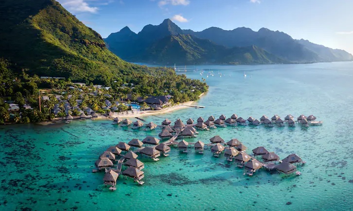 Aerial view of the overwater bungalows at Hilton Moorea Lagoon Resort & Spa, Moorea Island, French Polynesia