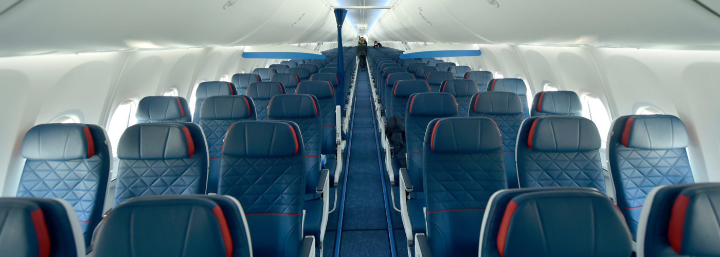 Empty rows of airplane seats