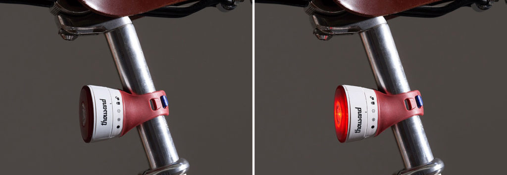 Two images of Thousand Traveler Magnetic Bike Lights attached to bike, one on and one off