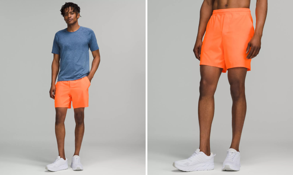Two views of the lululemon Pace Breaker Shorts in bright orange
