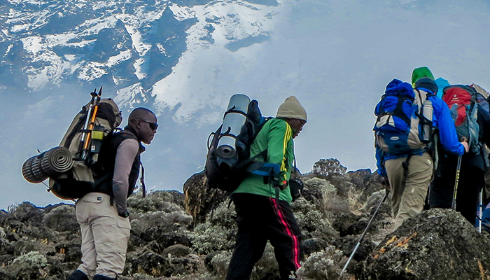 Group of people hiking Kilimanjaro Lemosho route